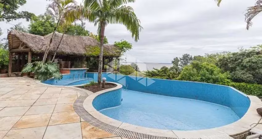 Casa com 4 quartos à venda na Rua Bororó, 301, Vila Assunção, Porto Alegre