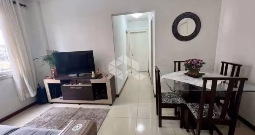 Apartamento semi mobiliado 2 dormitorio e vaga escriturada a venda no bairro partenon.