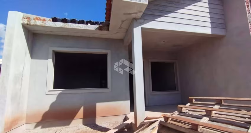 Casa geminada 02 dormitórios, com pátio, em Santa Cruz do Sul