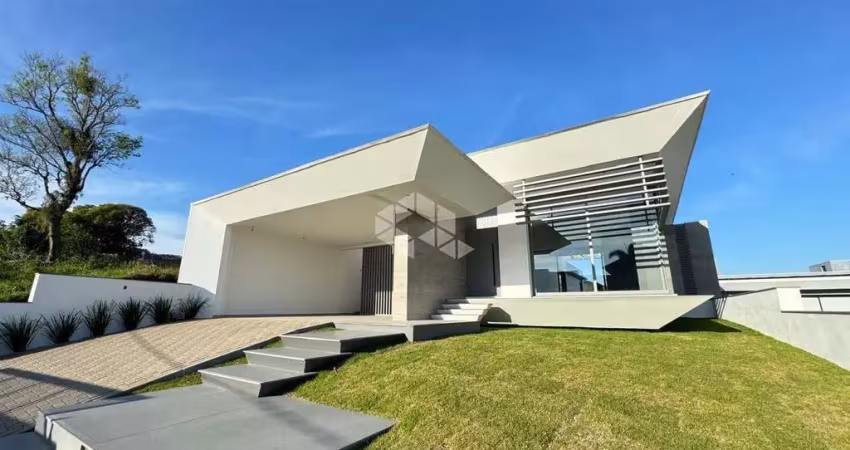 Casa de alto padrão, 03 suítes, em um dos bairros mais valorizados de santa cruz do sul!