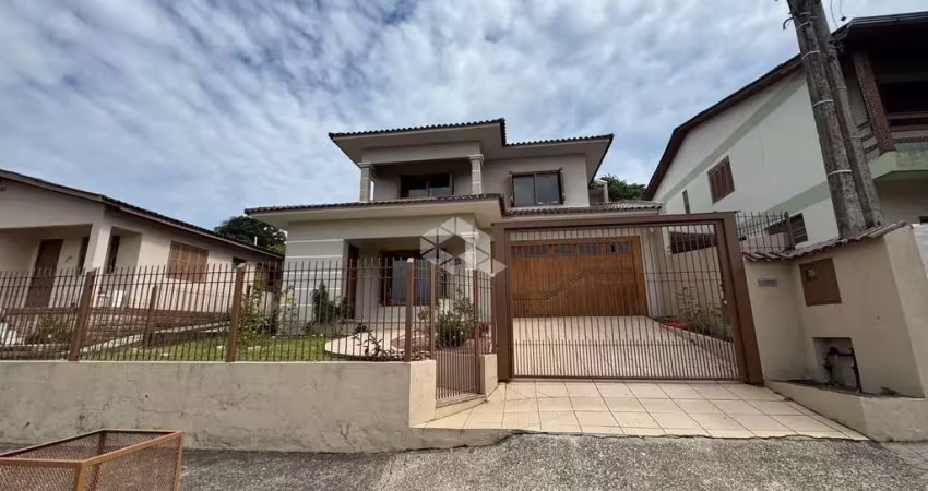 Casa com 3 dormitórios, sendo 1 suite, no bairro arroio grande