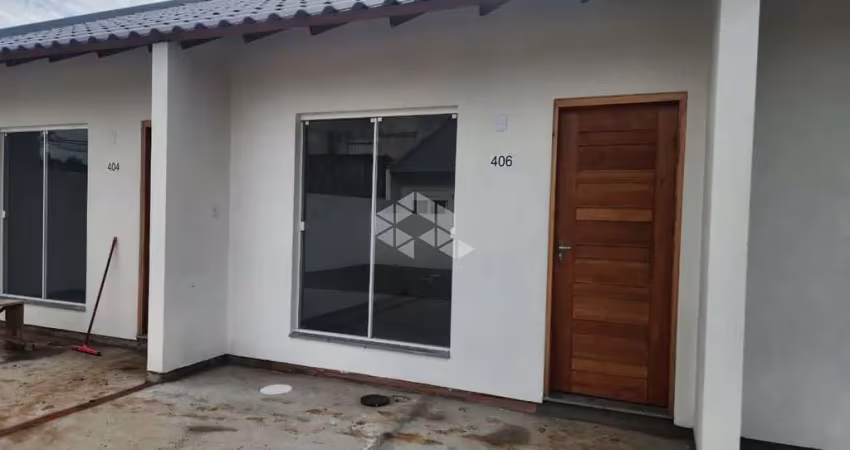 Casa geminada 01 dormitório no bairro arroio grande!