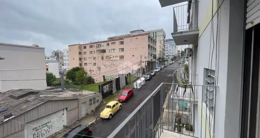 Apartamento amplo de 2 dormitórios no centro de santa maria - próximo à prefeitura