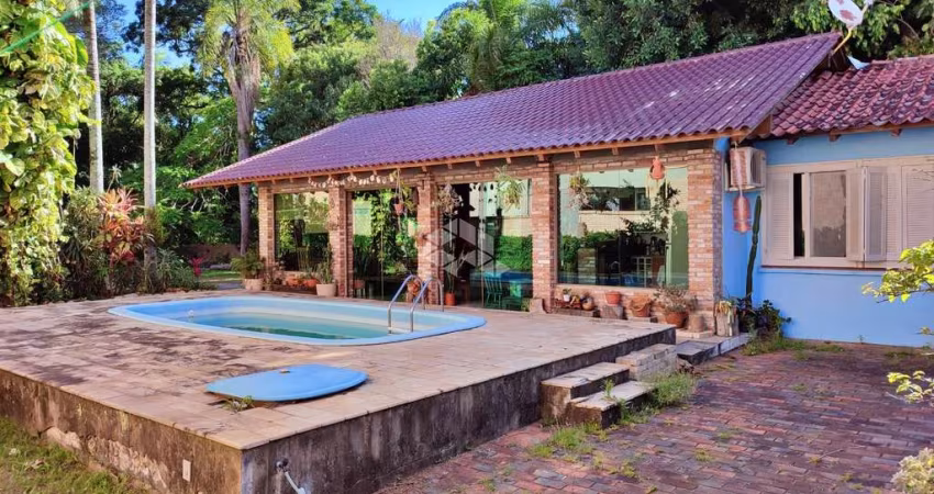 Casa com 292 m² e 4 quartos à venda no bairro Tristeza