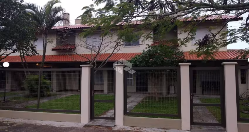 Sobrado em condomínio com 4 dormitórios e 1 vaga em capão novo