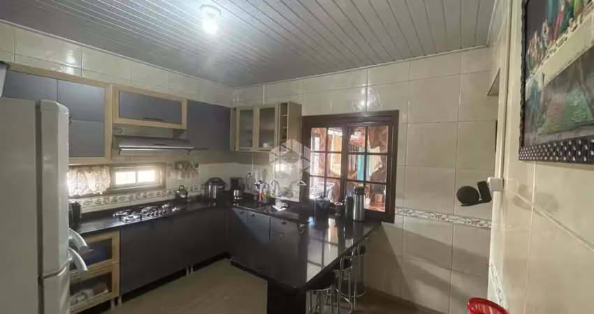 Casa com 5 quartos à venda na Rua Oscar Schick, 1146, Formoza, Alvorada