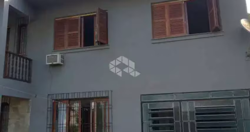 Casa de 03 dormitórios no Bairro Neópolis em Gravataí.