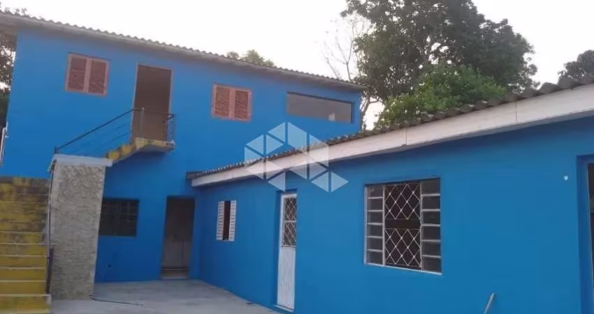 01 Casa com  02 kit nets para locação- Viamão