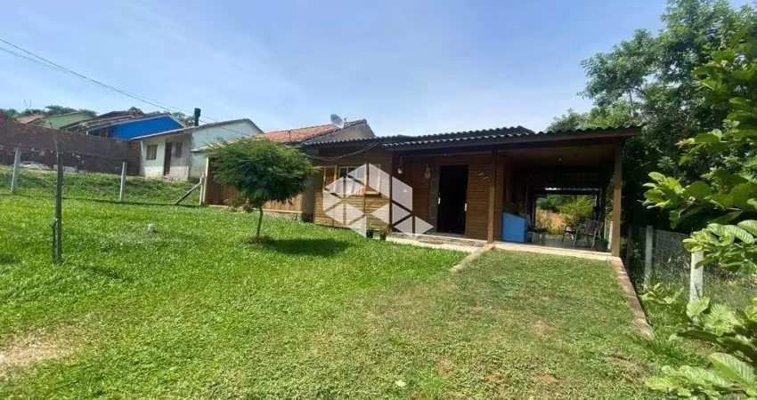 Casa com 2 quartos à venda na Topázio, 182, Fiuza, Viamão
