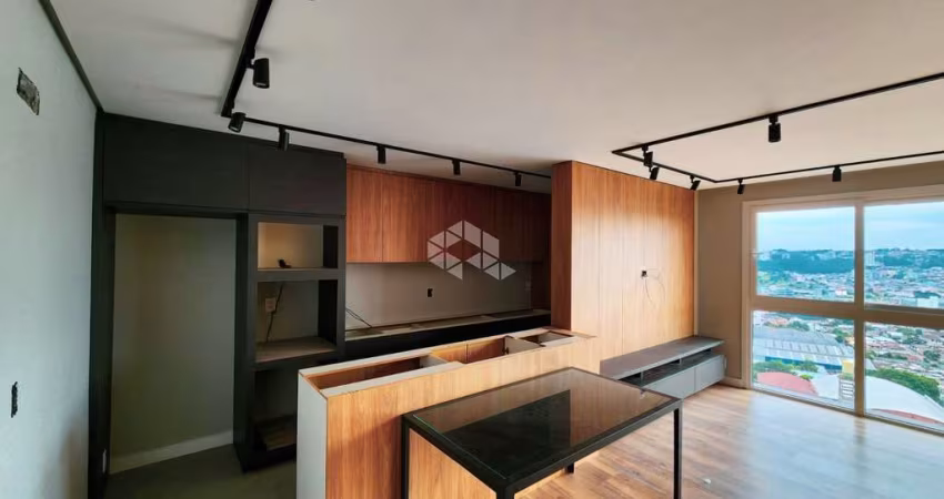 APARTAMENTO COM MARCENARIA COMPLETA, com 51m², 2 dormitório, 1 banheiro e uma vaga de garagem, ótima psoição solar