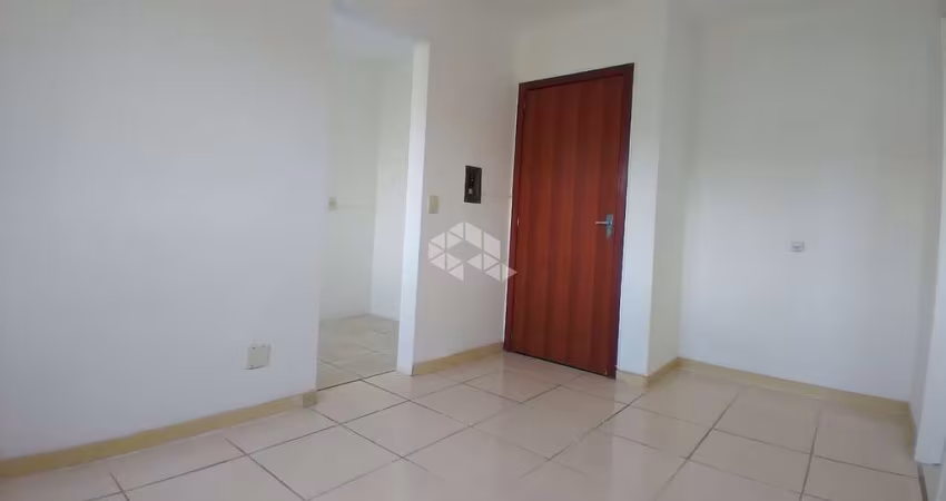 Apartamento de 1 dormitório com 1 vaga no bairro Santo Antônio.