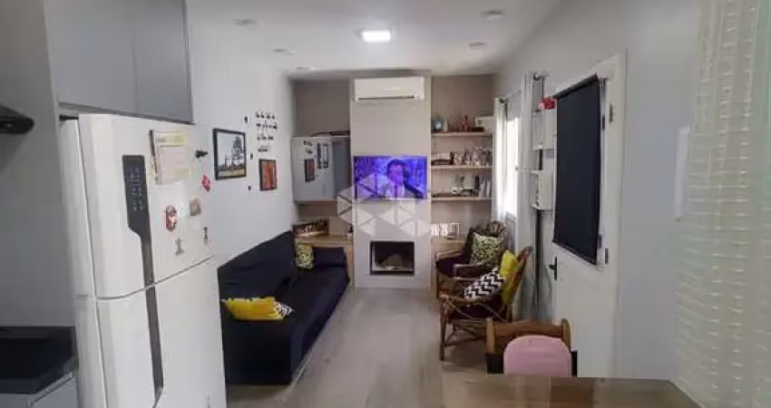 Casa de alvenaria com dois dormitórios no bairro menino deus