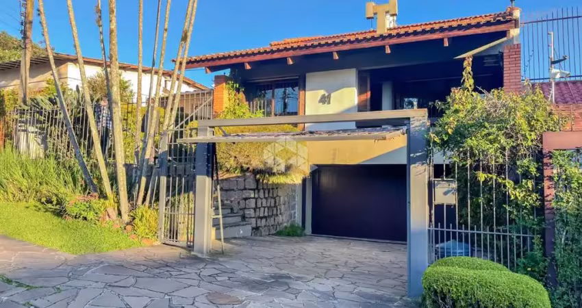 Casa com 3 quartos à venda na Rua Licínio Cardoso, 41, Chácara das Pedras, Porto Alegre