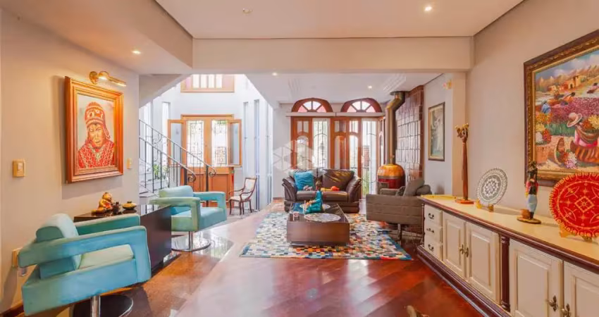 Casa sobrado com 3 dormitórios, 1 suíte e 4 vagas à venda no bairro jardim planalto em porto alegre com 397 m²