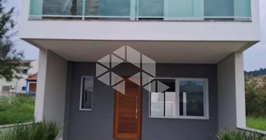 Casa 3 dormitórios sendo 1 suite com sacada 2 vagas de garagem atrás do Zaffari da Hípica -