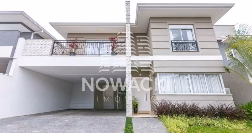 CASA EM CONDOMINIO COM 4 SUITES E 4 VAGAS EM SANTA FELICIDADE