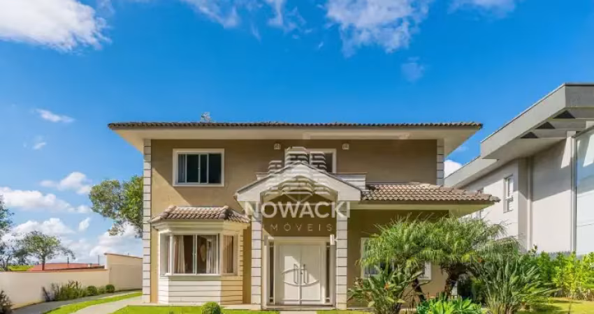 Excelente casa em condomínio com 4 quartos e 5 vagas no santa felicidade!