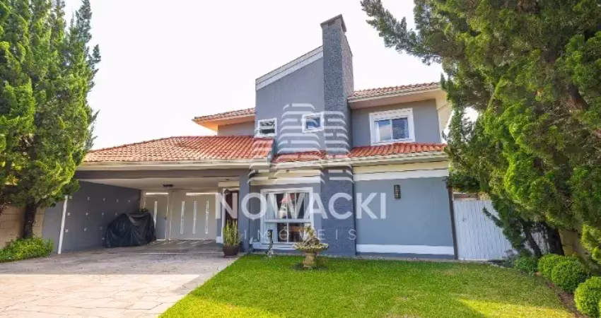 Casa de alto padrão em condomínio com 3 suítes e piscina em santa felicidade