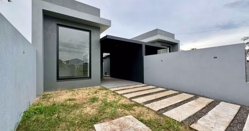 Casa geminada 3 dormitórios em região de moradores em tramandaí/rs