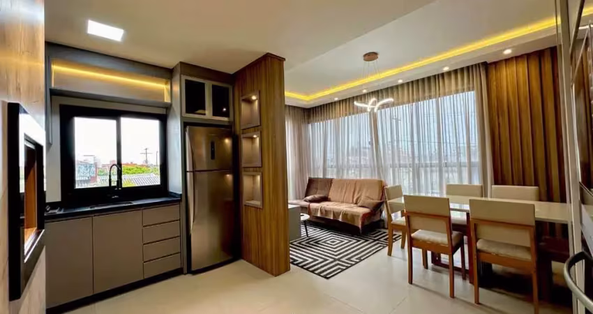 Apartamento mobiliado e decorado 2 dormitórios no centro de tramandaí.