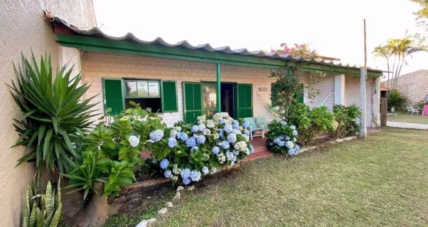 Residência composta por 3 dormitórios em Tramandaí/RS.
