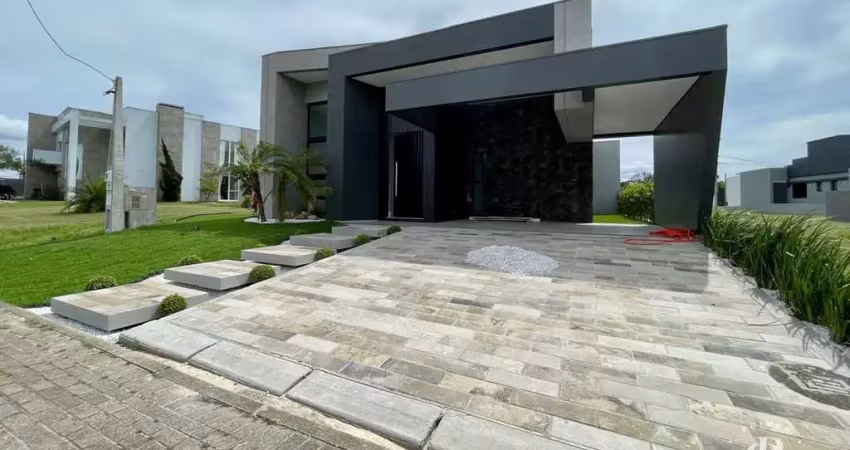 Casa moderna estilo contemporânea, sendo 3 suítes, no condomínio marítimo em tra