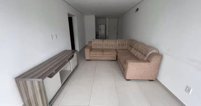 Apartamento 2 dormitórios sendo 1 suíte no centro de tramandaí