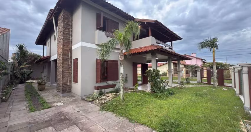 Sobrado com piscina dispondo de 5 dormitórios a venda na zona nova de tramandaí