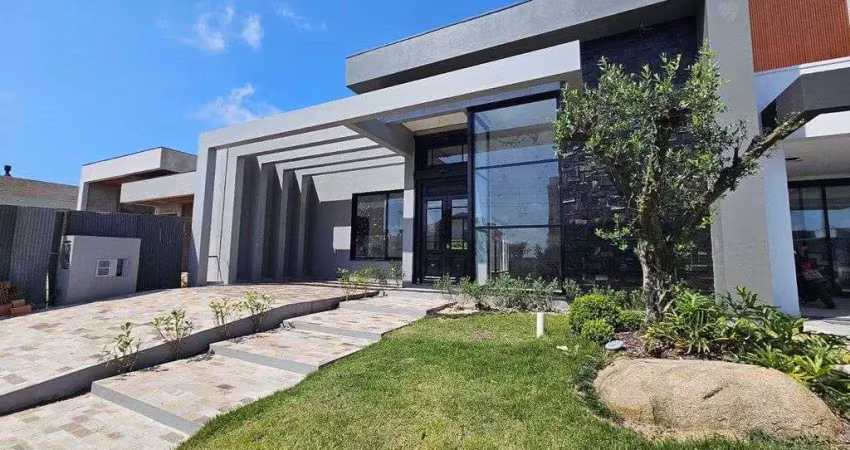 Excelente casa térrea em condomínio fechado a venda em tramandaí/rs
