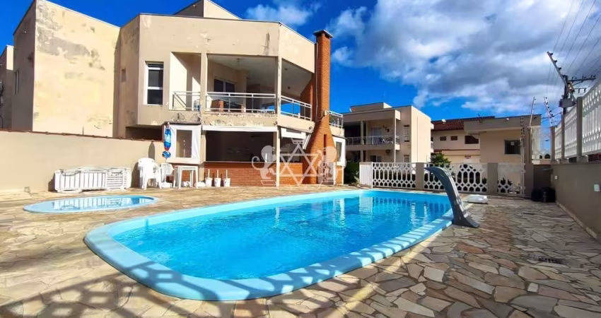 Casa em condomínio com 2 dormitórios à venda, 77m2 - Massaguaçu - Caraguatatuba/Sp