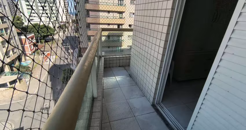 Apartamento à venda no bairro tupi, praia grande-sp: 1 quarto, 1 sala, 1 vaga de garagem, vista mar frente rua.