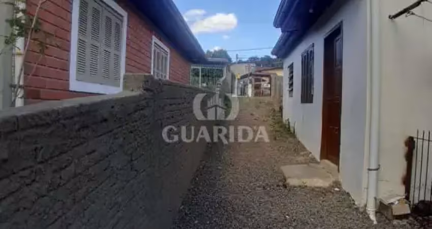 Casa com 2 quartos à venda na Rua Miguel Ascoleze, 186, Vila Nova, Porto Alegre
