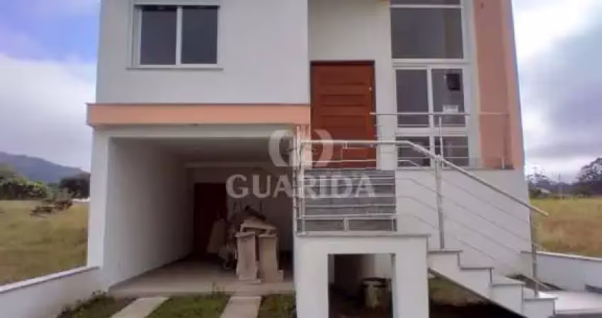 Casa com 3 quartos à venda na Afonso Lunardele, 75, Hípica, Porto Alegre