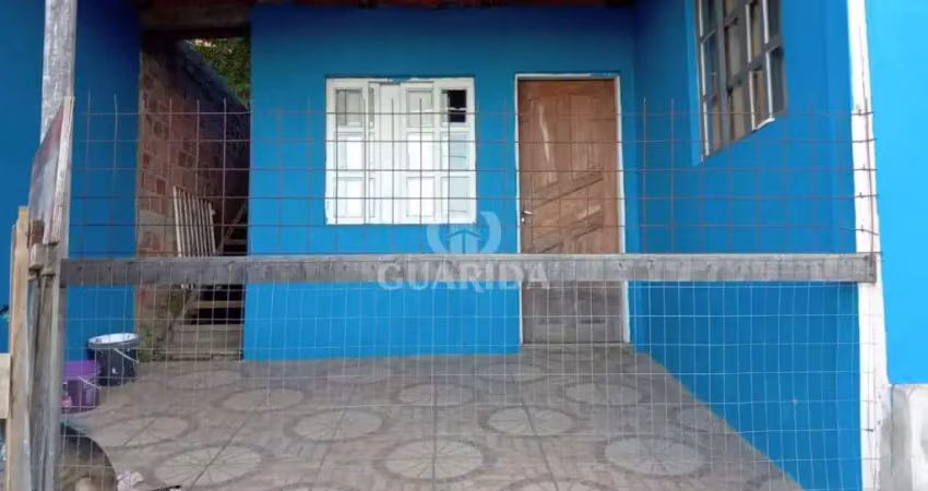 Casa com 2 quartos à venda na Rua Encantadora, 601, Partenon, Porto Alegre