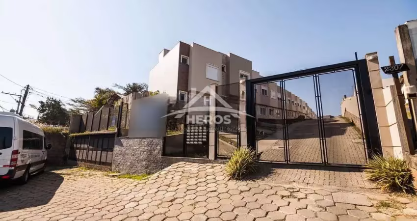 Casa em condomínio fechado com 2 quartos à venda na Rua Miguel Ascoleze, 125, Vila Nova, Porto Alegre