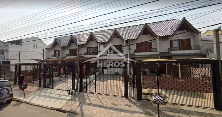 Casa com 3 quartos à venda na Rua Heitor Kramer, 254, Guarujá, Porto Alegre