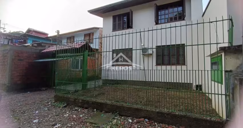 Casa com 6 quartos à venda na Rua Atílio Supertti, 2327, Vila Nova, Porto Alegre