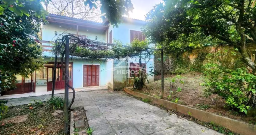 Casa com 4 quartos à venda na Rua Monte Claro, 74, Hípica, Porto Alegre