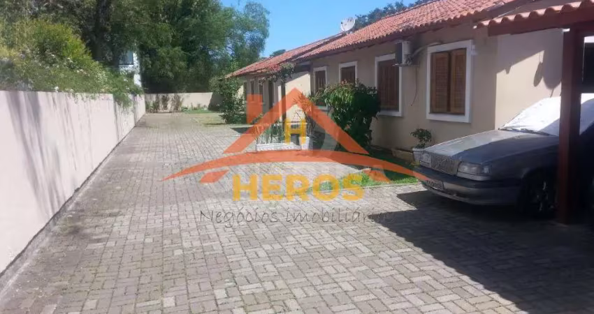 Casa em condomínio fechado com 2 quartos à venda na Rua das Espatódeas, 340, Ponta Grossa, Porto Alegre