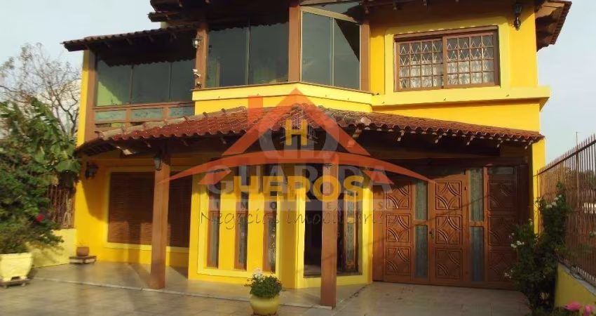 Casa com 4 quartos à venda na Rua Marquês do Maricá, 505, Vila Nova, Porto Alegre