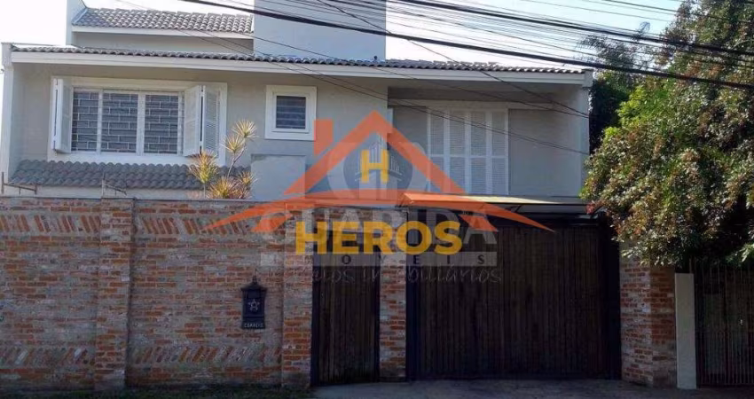 Casa com 6 quartos à venda na Rua Arapei, 228, Cristal, Porto Alegre