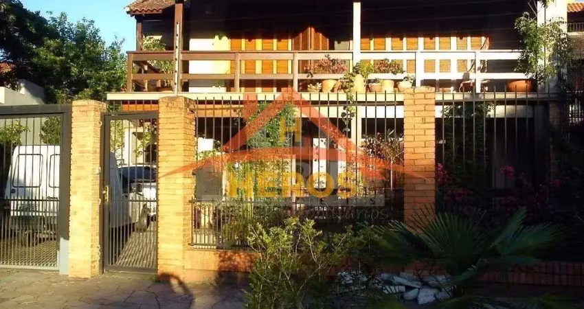 Casa com 3 quartos à venda na Avenida Guaíba, 13774, Ipanema, Porto Alegre