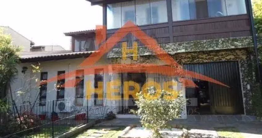 Casa com 3 quartos à venda na Avenida Guarujá, 140, Guarujá, Porto Alegre