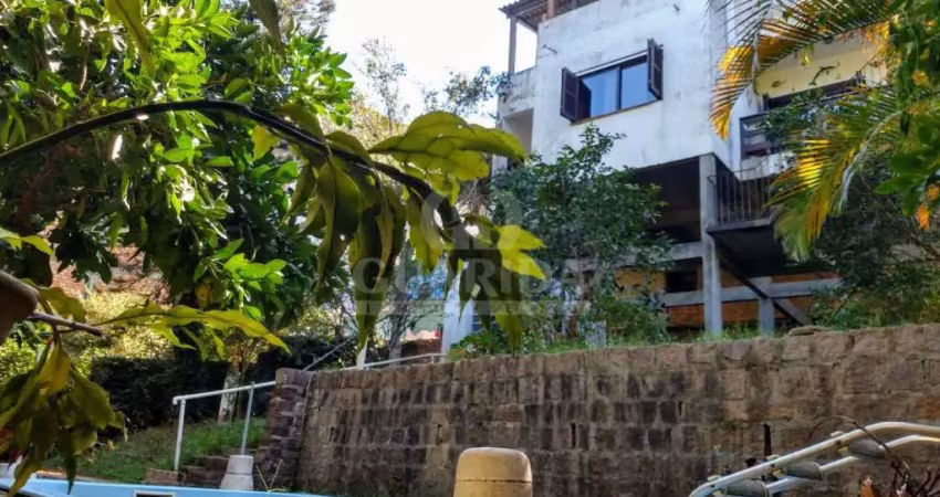 Casa com 5 quartos à venda na Avenida Vicente Monteggia, 2231, Cavalhada, Porto Alegre