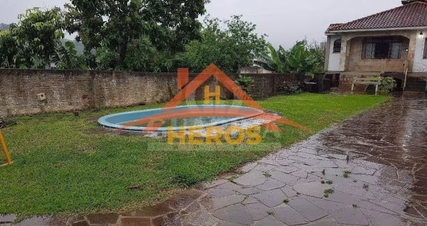 Casa com 3 quartos à venda na Rua Marquês do Maricá, 168, Vila Nova, Porto Alegre