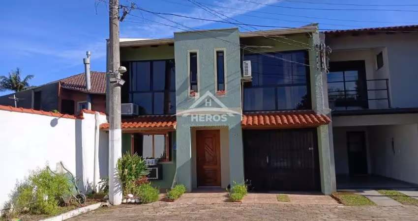 Casa em condomínio fechado com 3 quartos à venda na Avenida da Cavalhada, 6445, Cavalhada, Porto Alegre