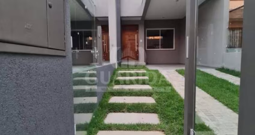 Casa com 3 quartos à venda na Rua Itacyr Rossi, 31, Guarujá, Porto Alegre