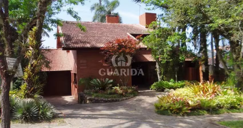 Casa com 3 quartos à venda na Avenida Arlindo Pasqualini, 575, Jardim Isabel, Porto Alegre