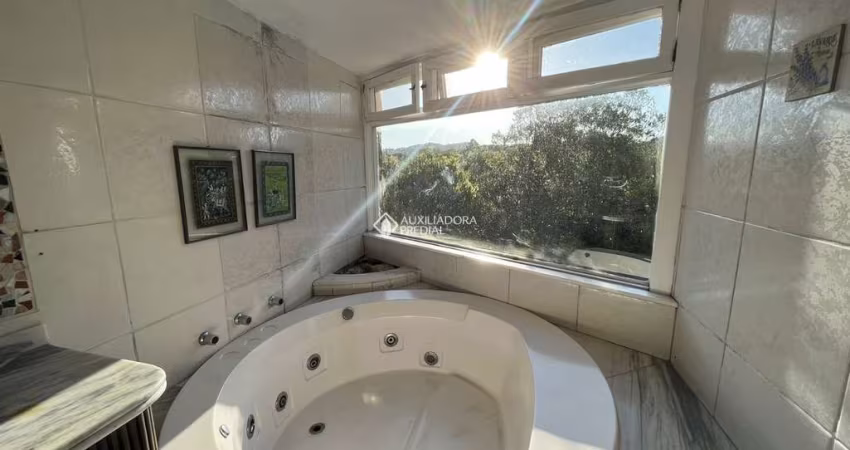 Casa em condomínio fechado com 3 quartos para alugar na Rua Tocantins, 937, Lomba do Pinheiro, Porto Alegre