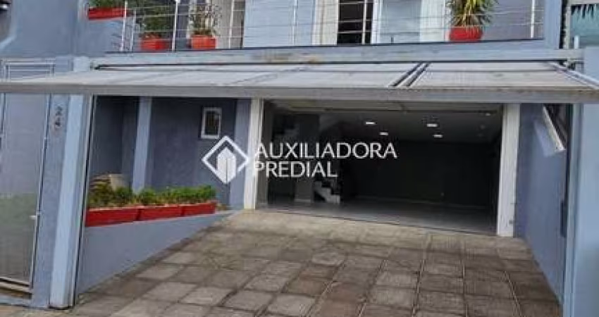 Casa em condomínio fechado com 4 quartos para alugar na Rua Walter Porto Filho, 240, Mário Quintana, Porto Alegre